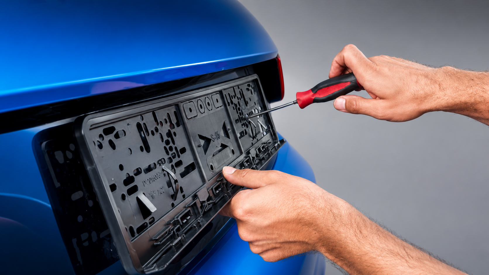 No-drill rego frame being installed on a vehicle with secure Australian number plate holder fitment