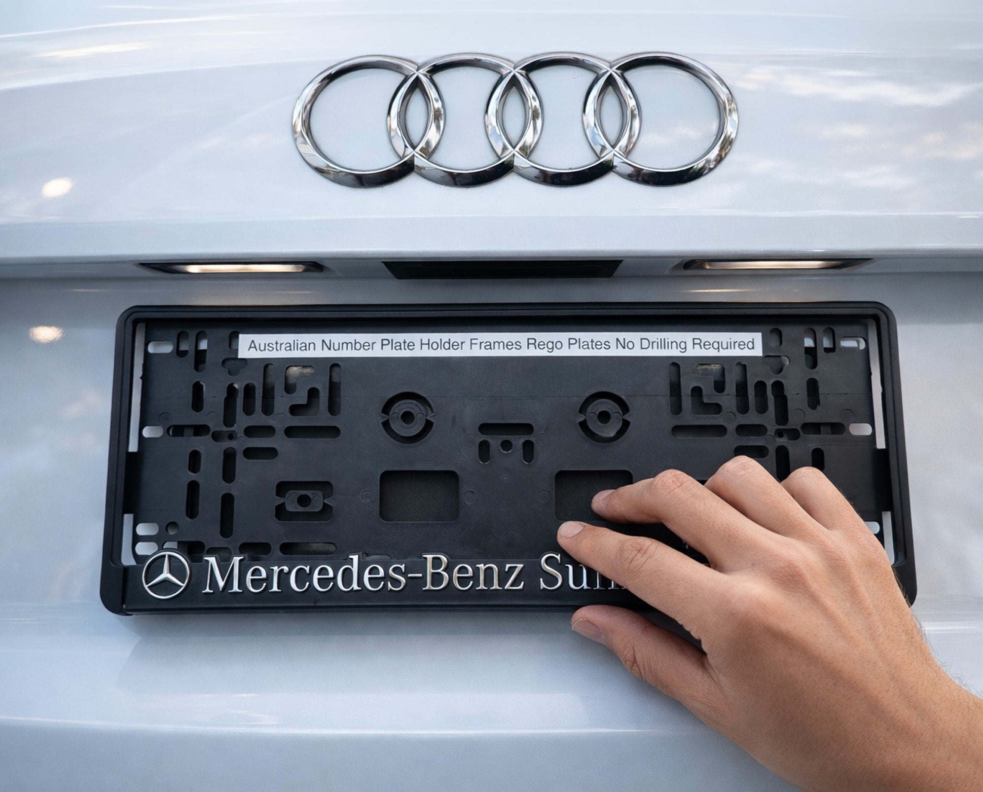 Branded rego frame fitted to an Audi with no-drill Australian number plate holder design